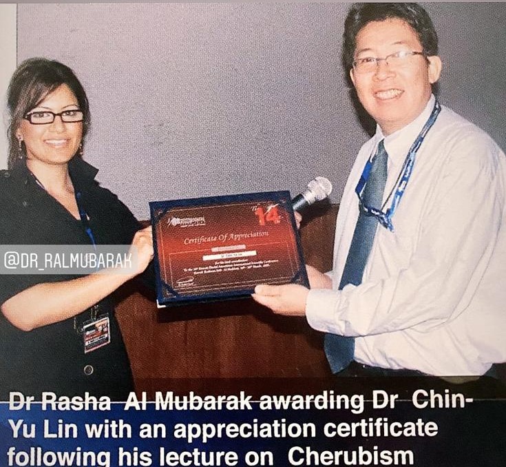 Dr rasha giving Dr Chin YuLin
